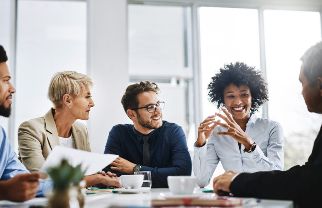 With the help of the whole team, anything is possible. Shot of a group of businesspeople sitting together in a meeting.