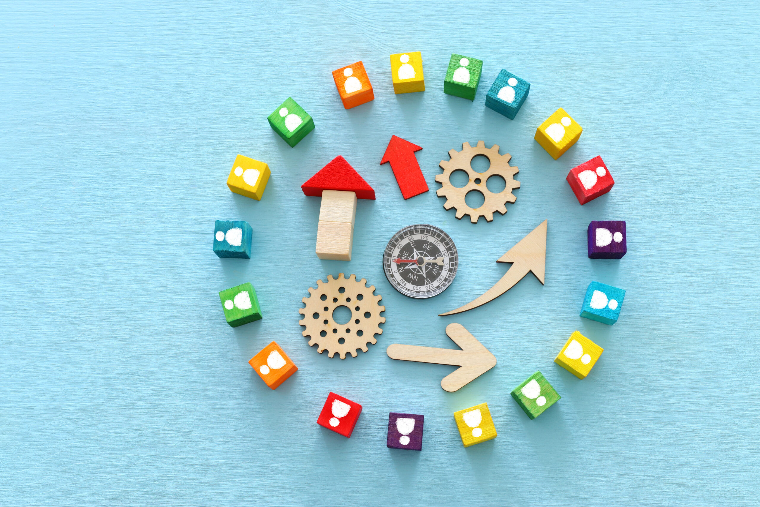 image of colorful blocks with people icons over wooden table ,human resources and management concept