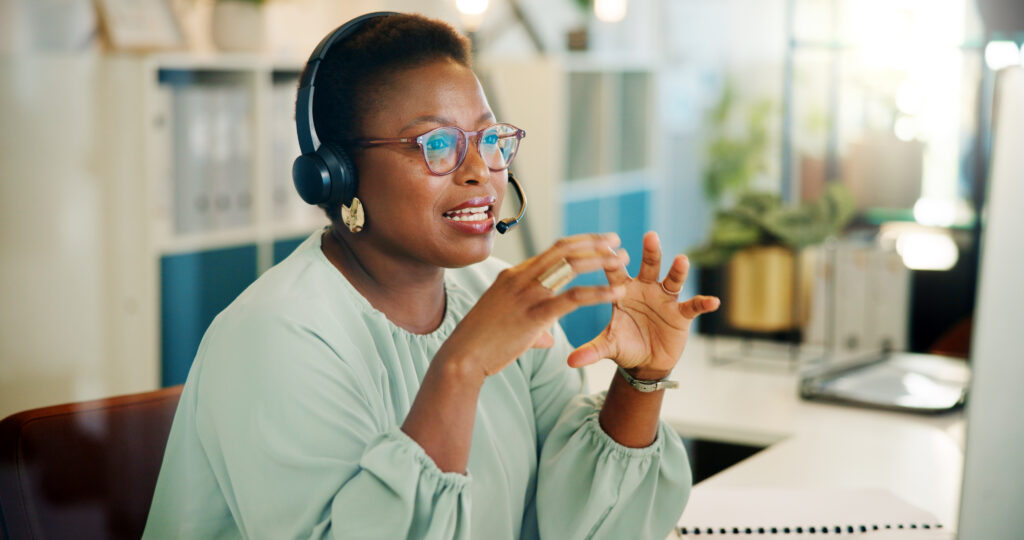 Explain, agent or black woman on computer in call center for consulting, questions or loan advice. Solution, advisor or African virtual assistant talking for telemarketing info or sales communication