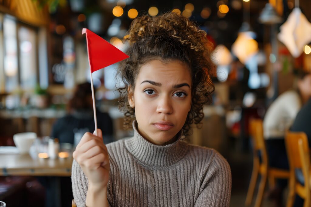 Woman holding red flag, dating concept